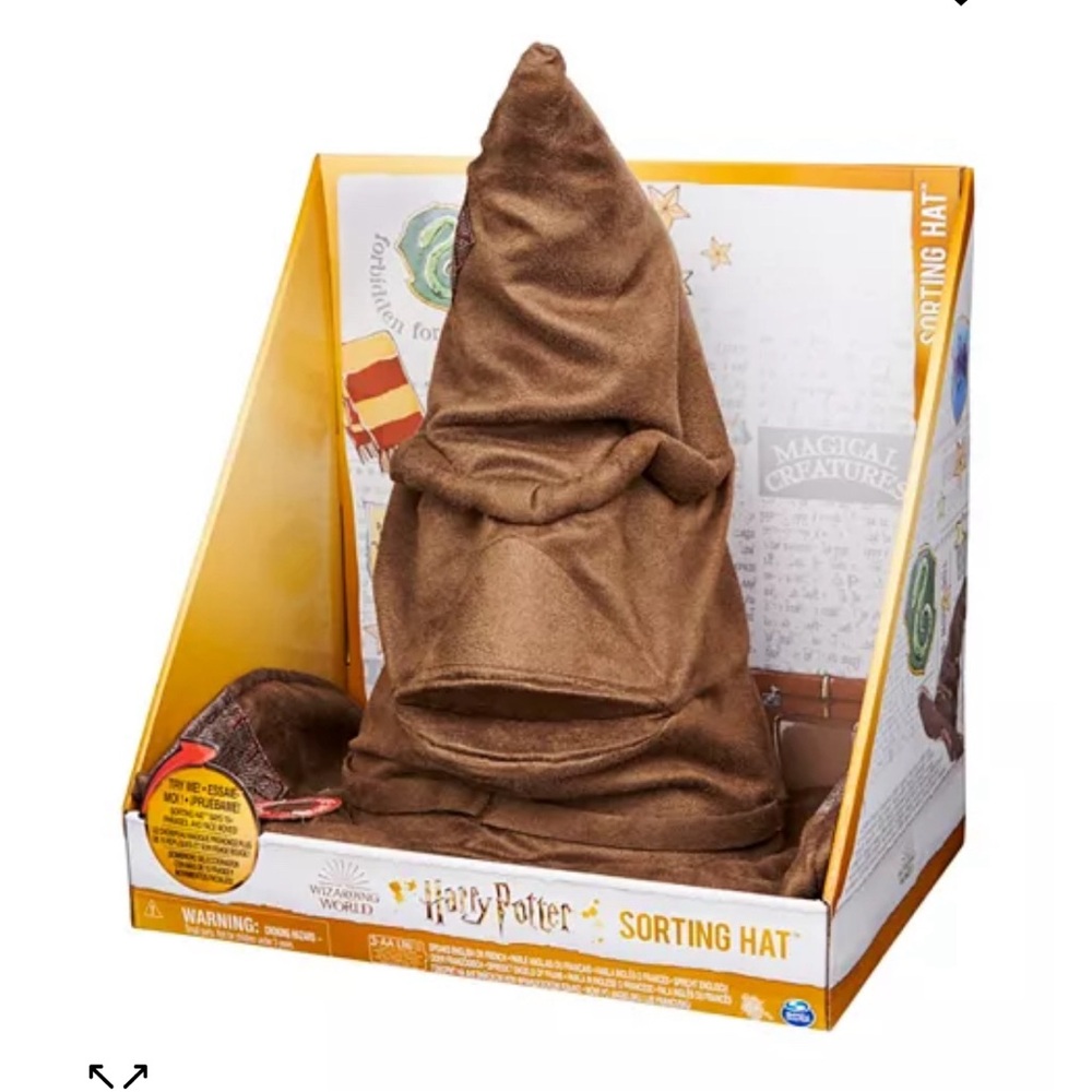 Harry Potter sorting hat. Like new. Says 15 phrases &chooses a Hogwarts House